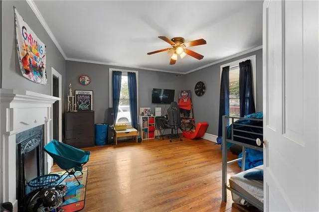 a view of a livingroom with furniture and a fireplace
