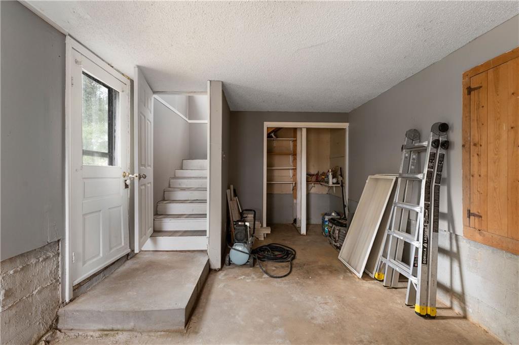 712 College Street Calhoun, GA 30701 - Photo 25 of 31 a view of a room with gym equipment