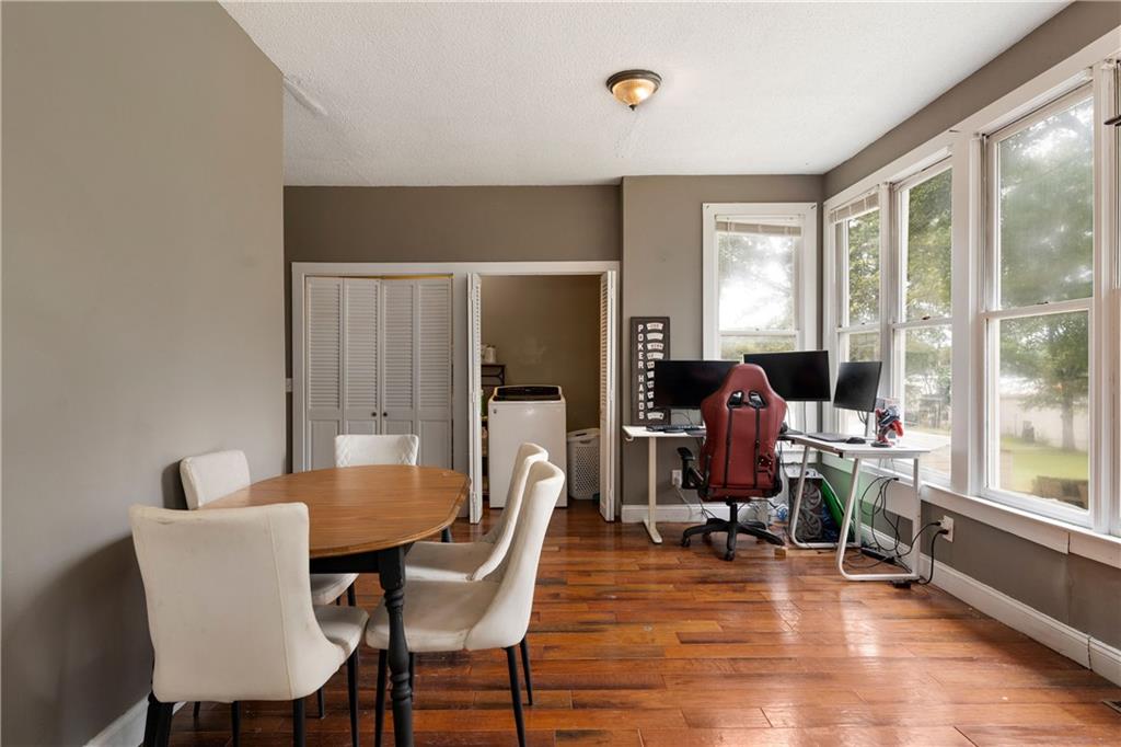 712 College Street Calhoun, GA 30701 - Photo 4 of 31 a view of a dining room with furniture window and outside view