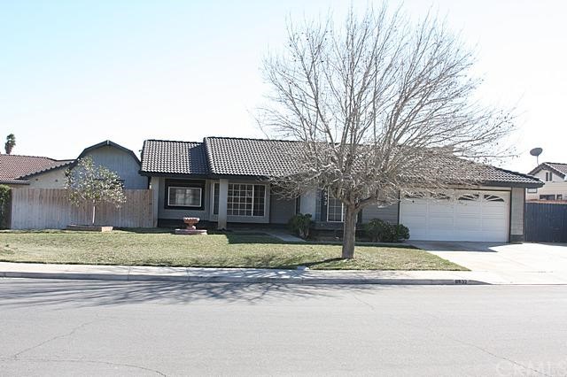 6632 Solano Drive Riverside, CA 92509 - Photo 1 of 1 a house that has a tree in front of it