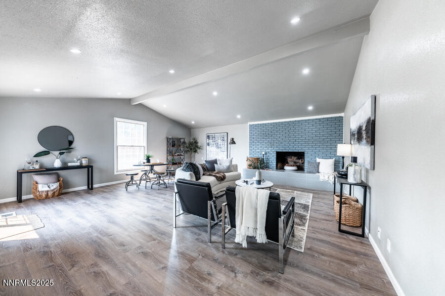 3390 Cashill Boulevard Reno, NV 89509 - Photo 23 of 51 a living room with furniture flat screen tv and a wooden floor