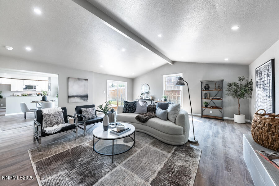 3390 Cashill Boulevard Reno, NV 89509 - Photo 25 of 51 a living room with furniture and wooden floor