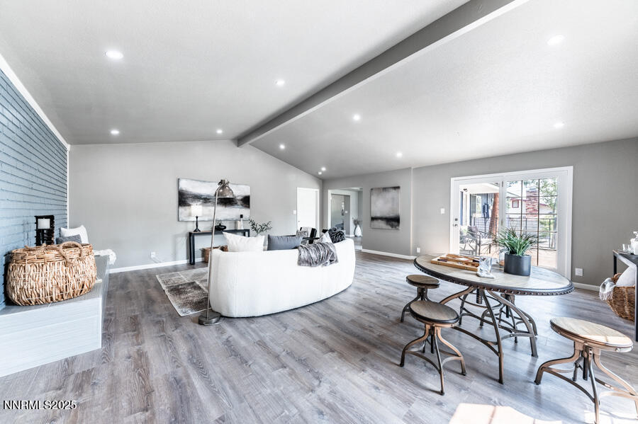 3390 Cashill Boulevard Reno, NV 89509 - Photo 26 of 51 a living room with furniture and wooden floor