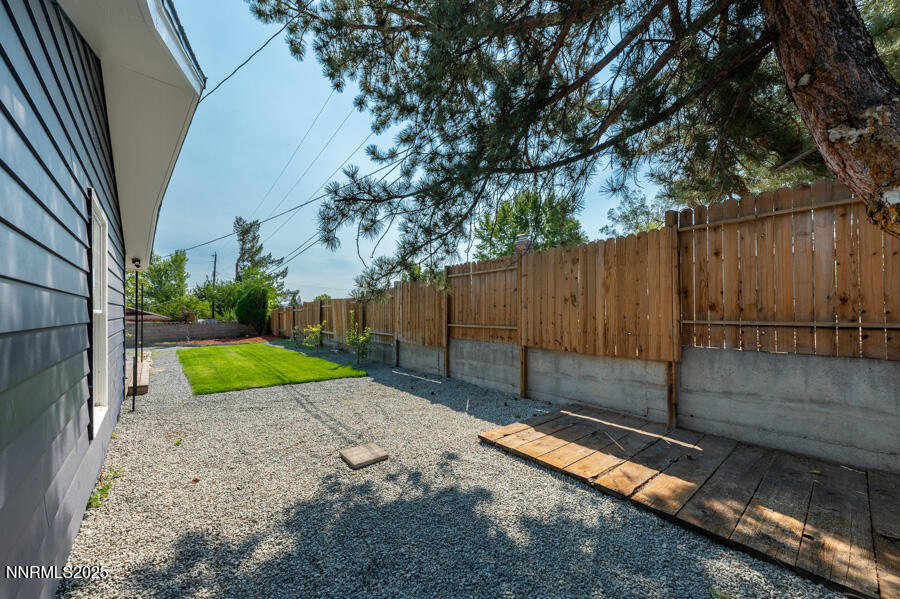 3390 Cashill Boulevard Reno, NV 89509 - Photo 47 of 51 a view of a backyard with wooden fence