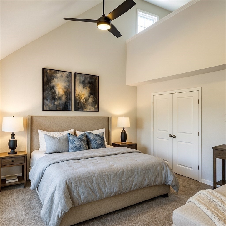 3 Ambrose Way, Unit 3 Shirley, MA 01464 - Photo 15 of 21 a bedroom with a bed and a chandelier