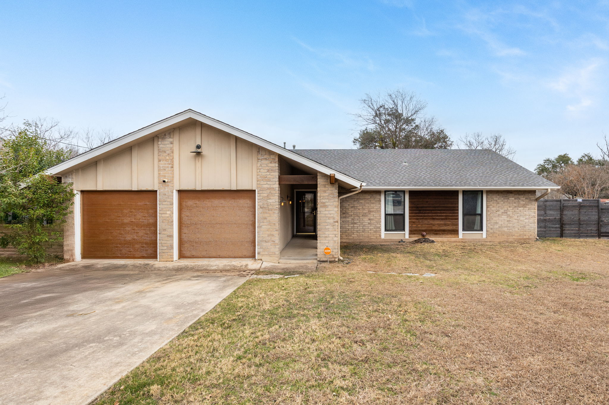 612 Meadowbrook Drive Georgetown, TX 78628 - Photo 2 of 35 View of front facade featuring a garage, driveway, and brick siding