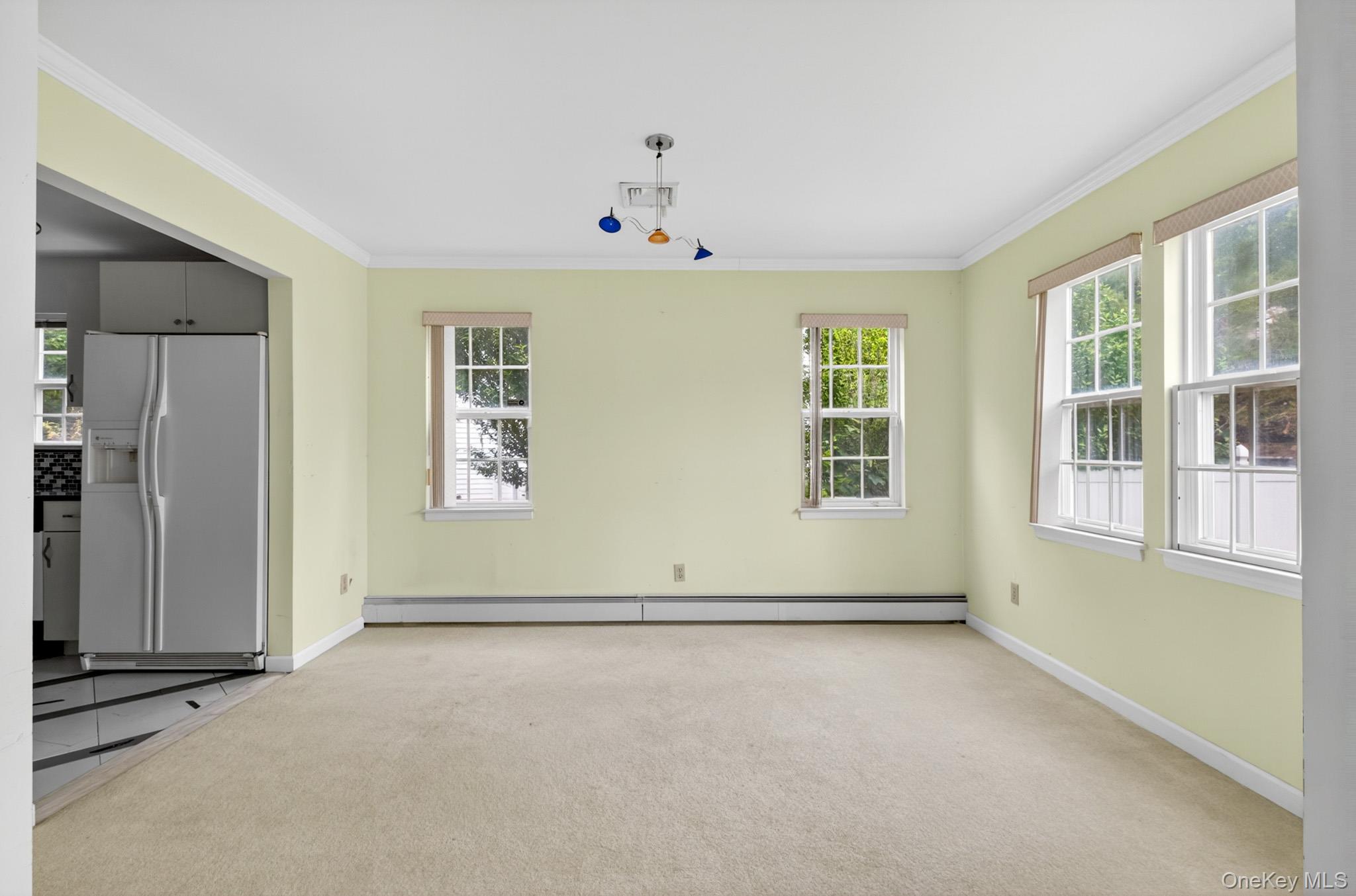82 B Inwood Road Port Washington, NY 11050 - Photo 10 of 41 an empty room with windows