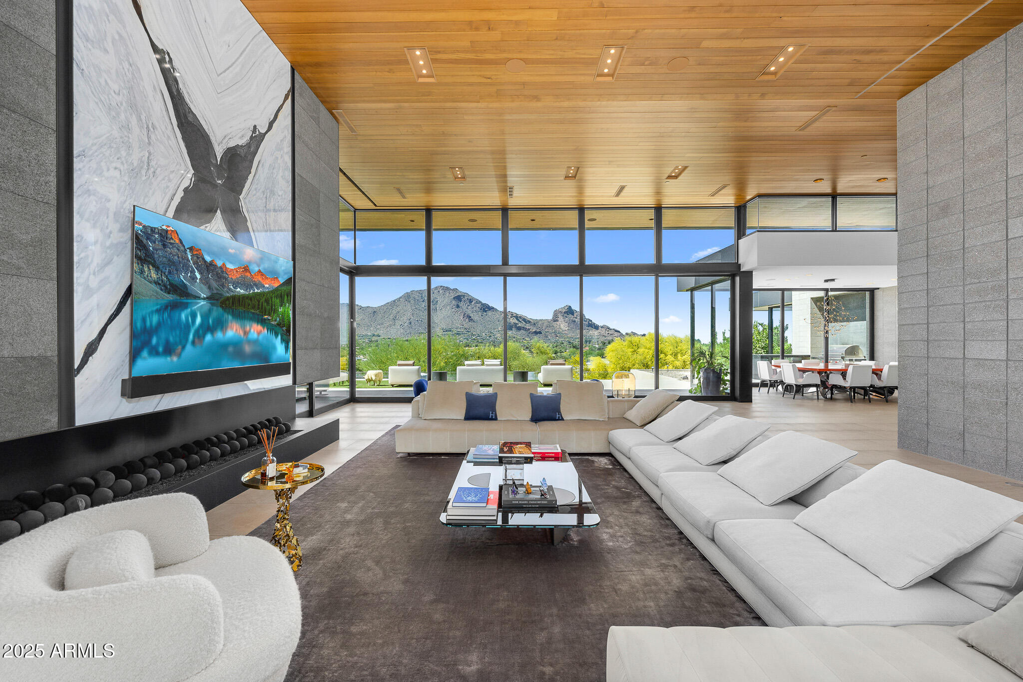6149 East Indian Bend Road Paradise Valley, AZ 85253 - Photo 10 of 77 a living room with furniture and a large window