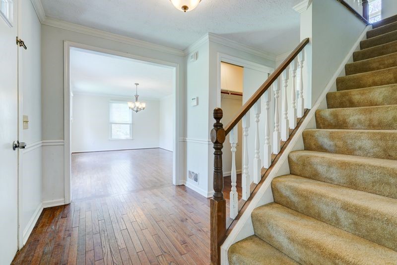 44 Latchmere Drive Victor, NY 14564 - Photo 23 of 50 FOYER VIEW AT THE BOTTOM OF THE STAIRS LOOKING TOW