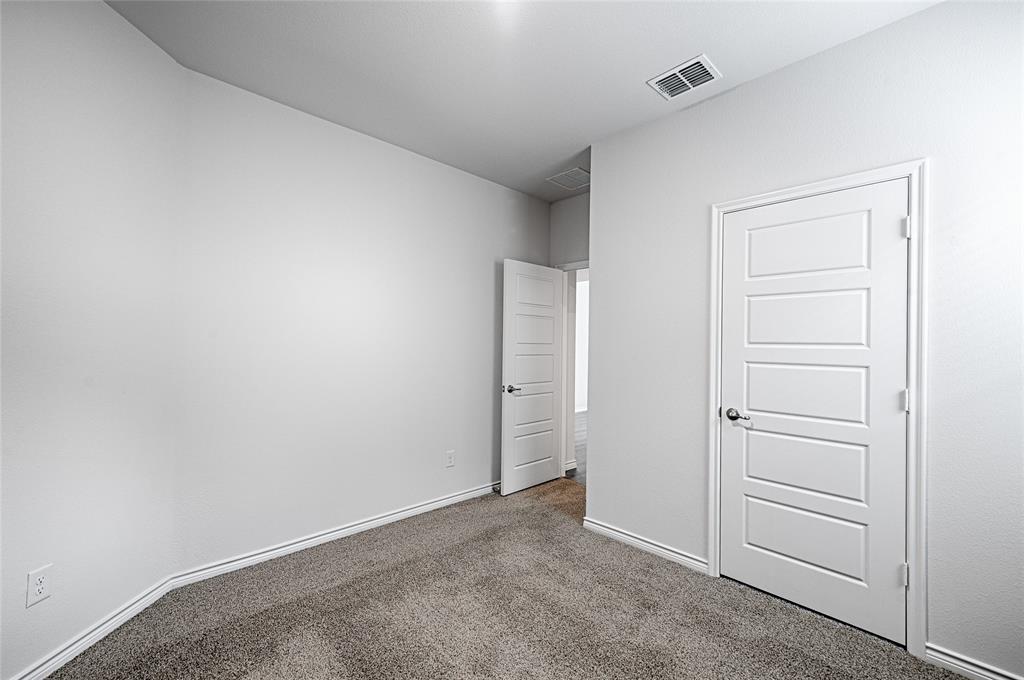 2427 Grapevine Way Celina, TX 75009 - Photo 14 of 38 a view of an empty room