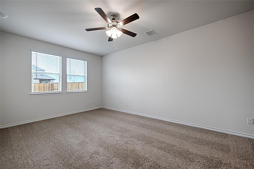 2427 Grapevine Way Celina, TX 75009 - Photo 18 of 38 an empty room with a window