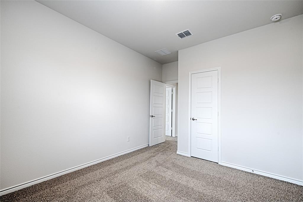 2427 Grapevine Way Celina, TX 75009 - Photo 30 of 38 a view of an empty room
