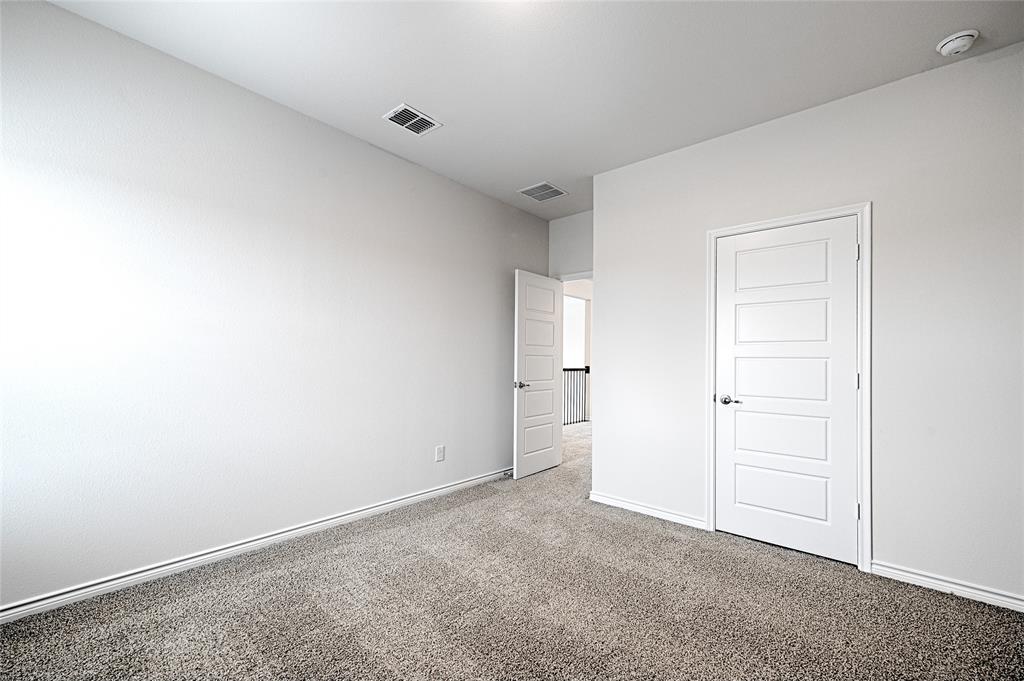 2427 Grapevine Way Celina, TX 75009 - Photo 32 of 38 a view of an empty room
