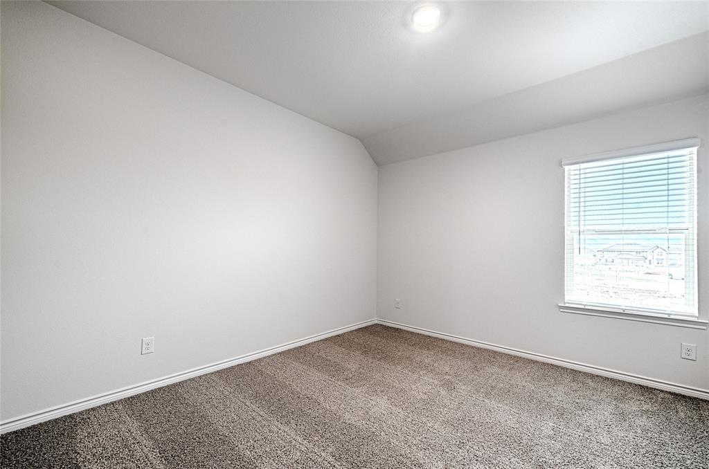 2427 Grapevine Way Celina, TX 75009 - Photo 33 of 38 an empty room with a window