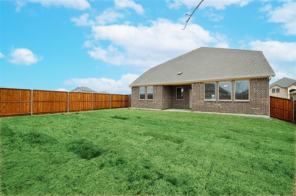 2427 Grapevine Way Celina, TX 75009 - Photo 37 of 38 a front view of a house with yard
