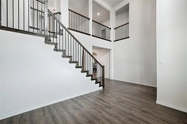 a view of entryway with wooden floor