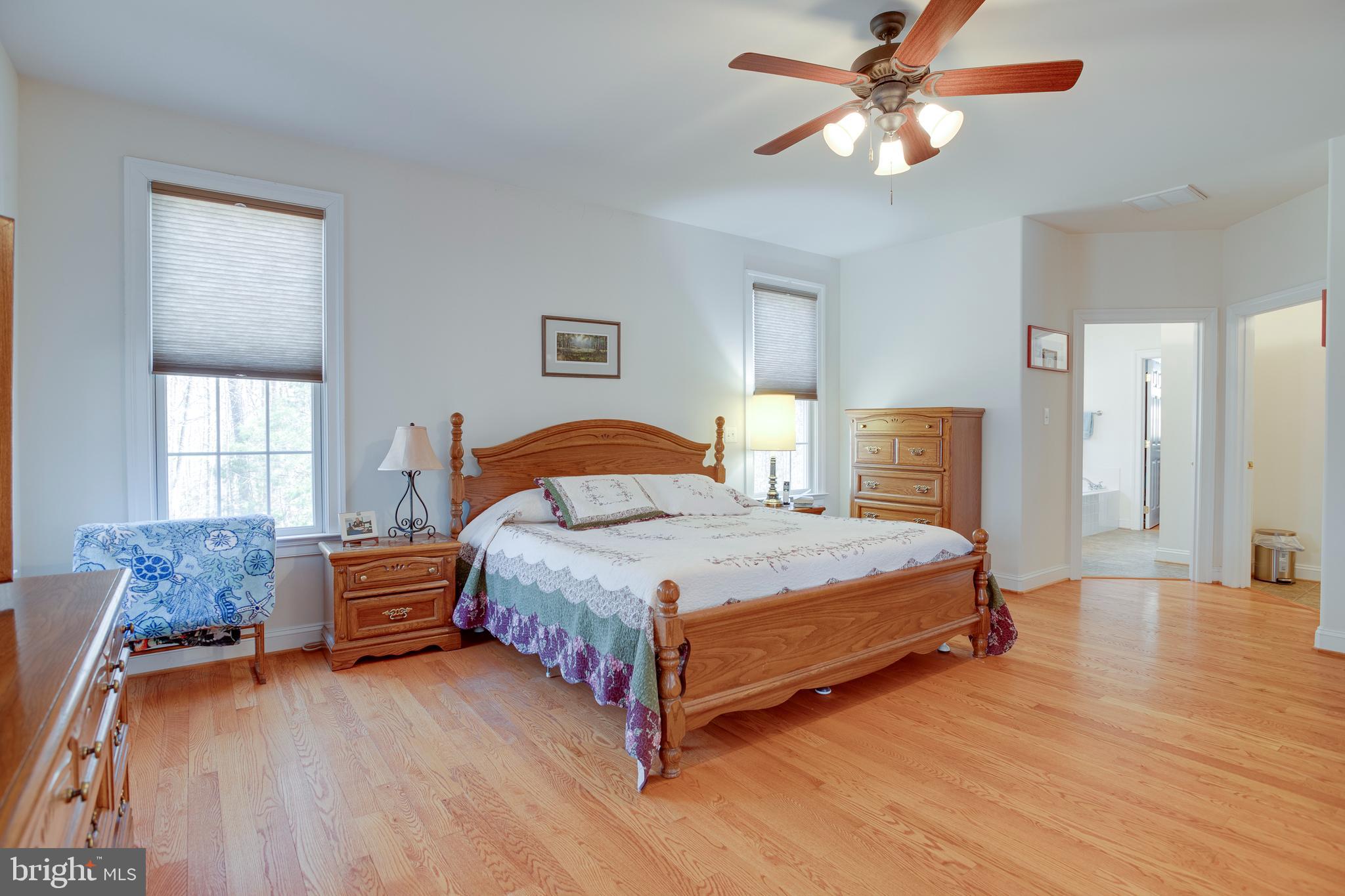 3279 Ridgeview Road Reva, VA 22735 - Photo 23 of 87 a bedroom with a bed chandelier and a window