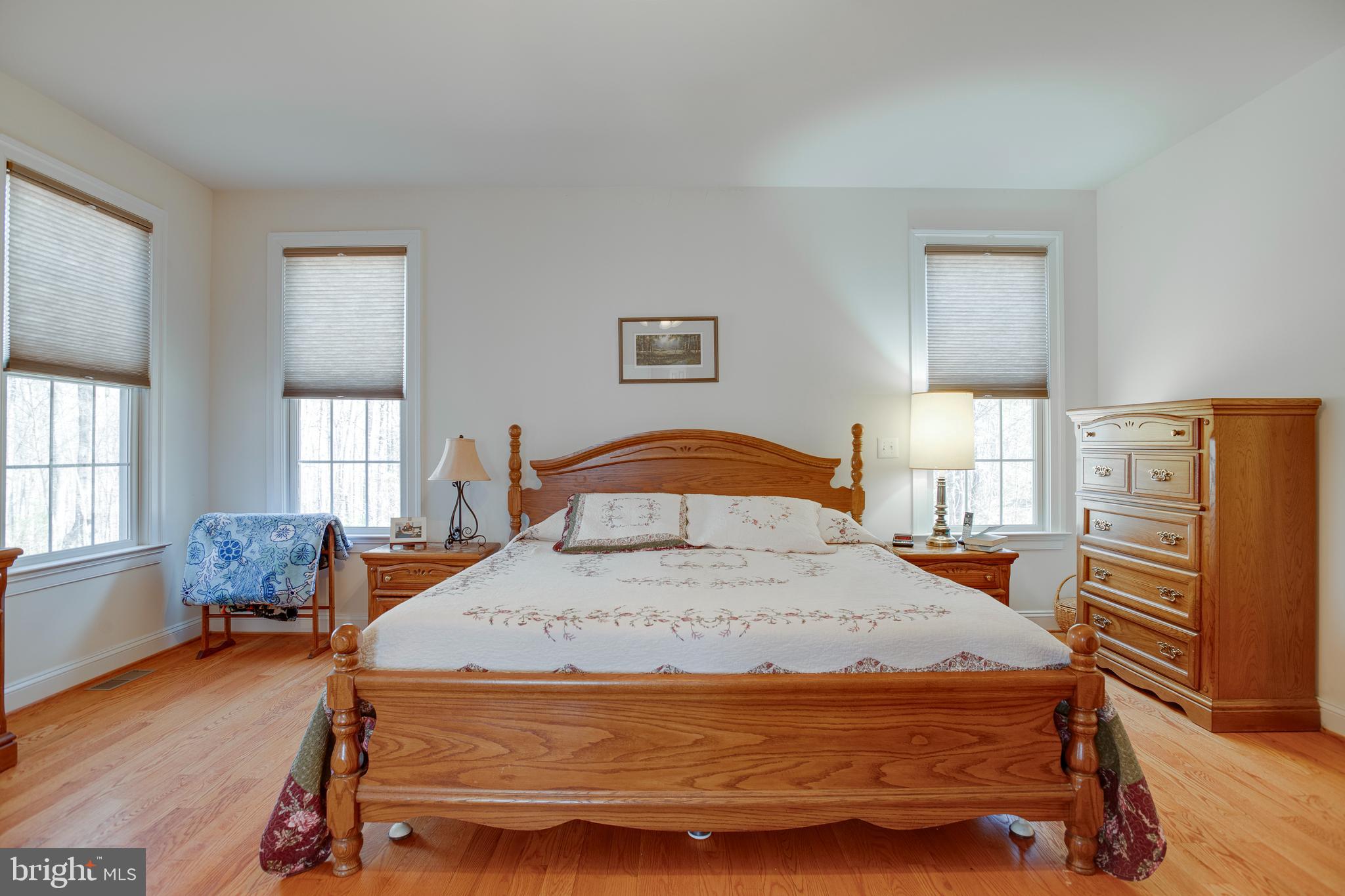 3279 Ridgeview Road Reva, VA 22735 - Photo 24 of 87 a bedroom with a bed and wooden floor