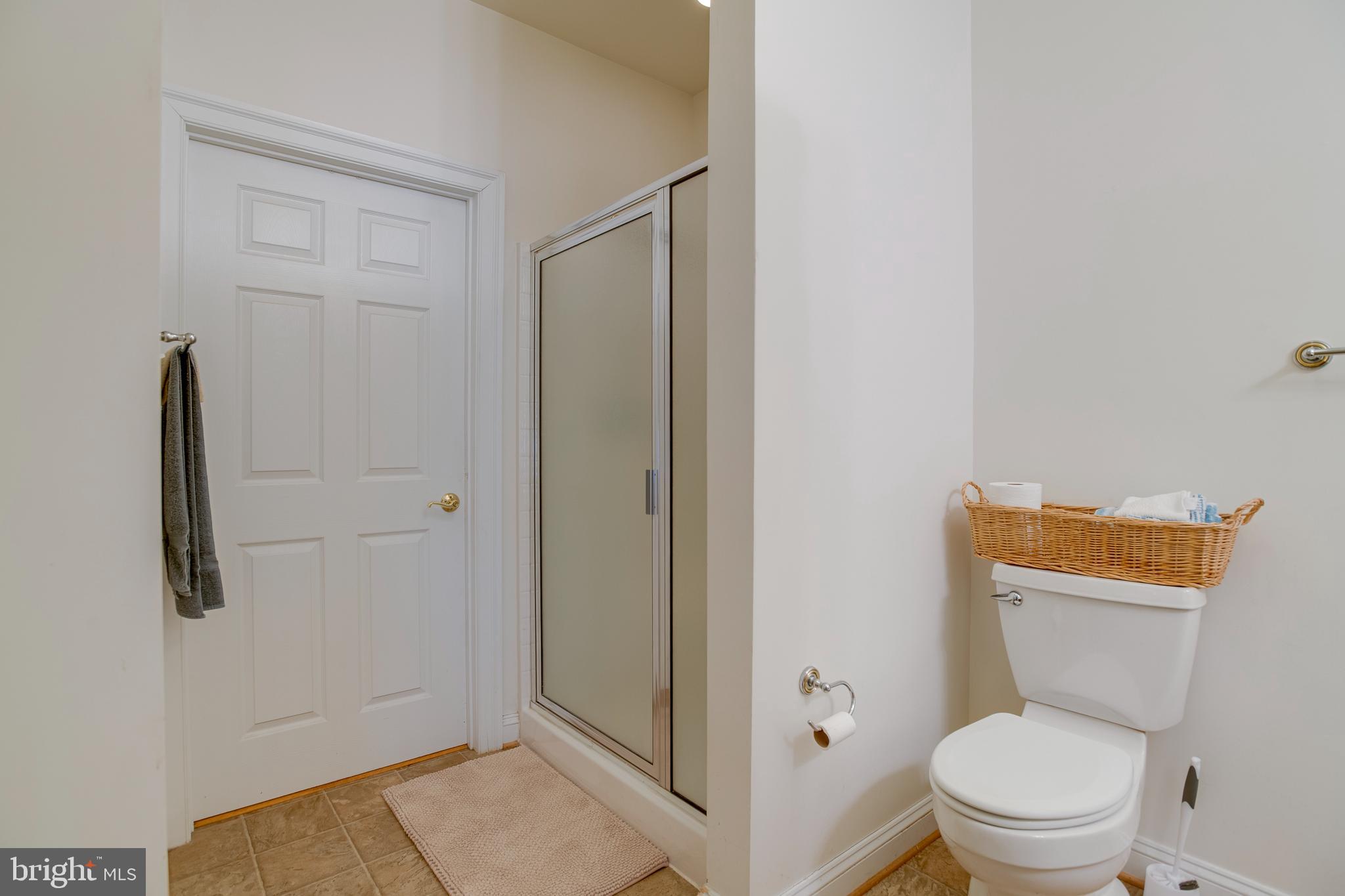 3279 Ridgeview Road Reva, VA 22735 - Photo 30 of 87 a white toilet sitting next to a bathroom sink