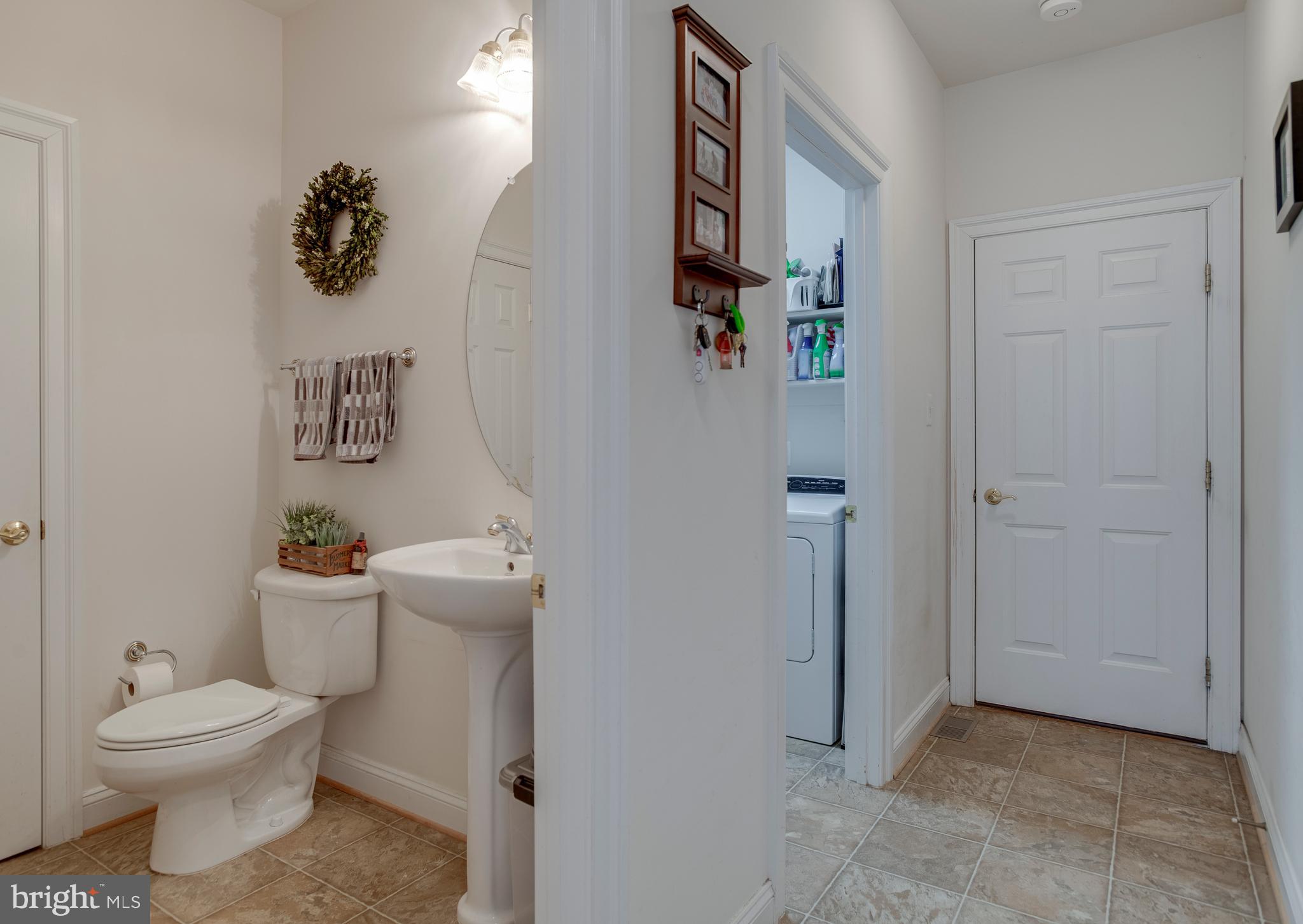3279 Ridgeview Road Reva, VA 22735 - Photo 32 of 87 a bathroom with a toilet sink and mirror