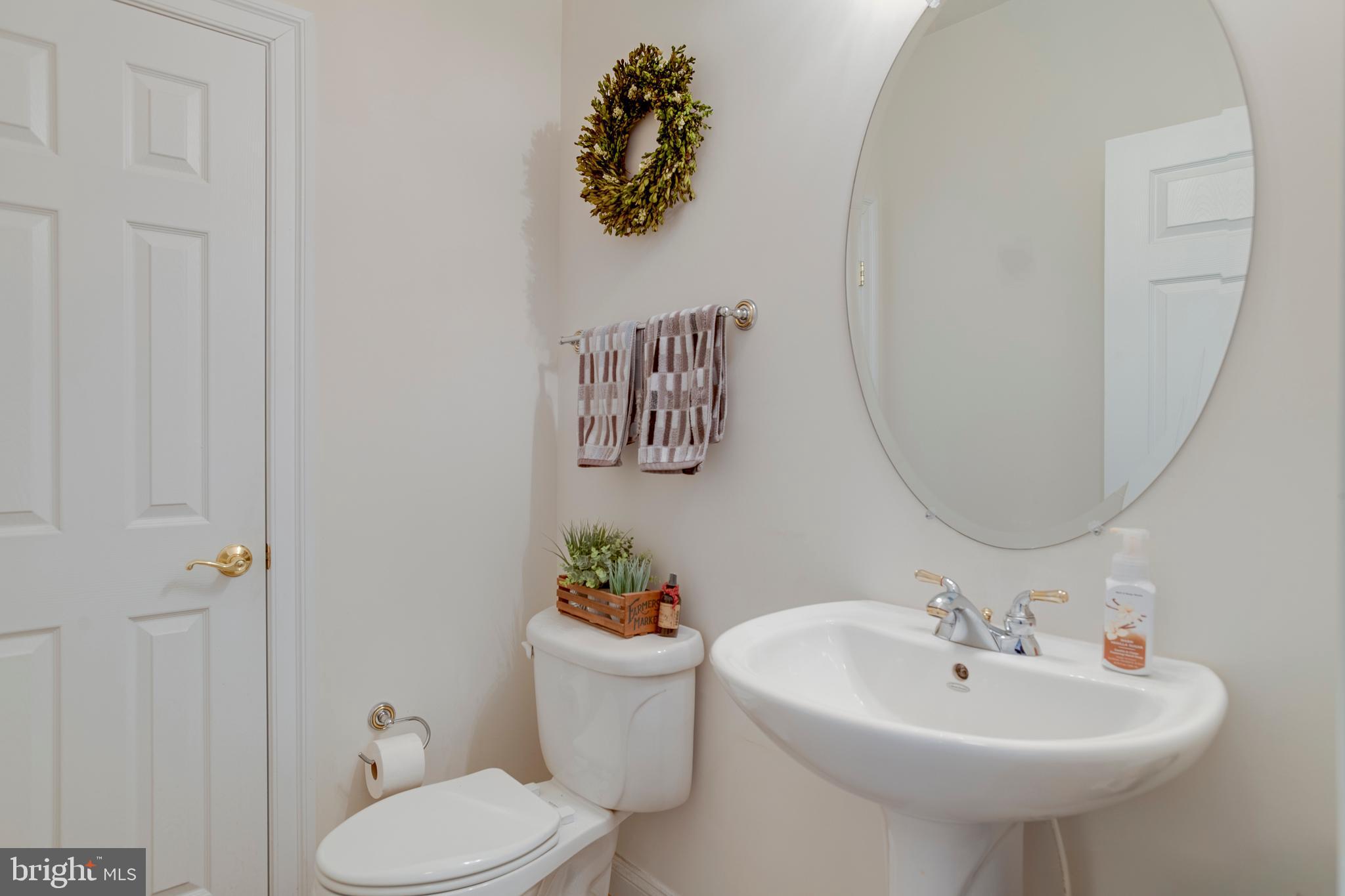 3279 Ridgeview Road Reva, VA 22735 - Photo 33 of 87 a bathroom with a sink mirror and toilet