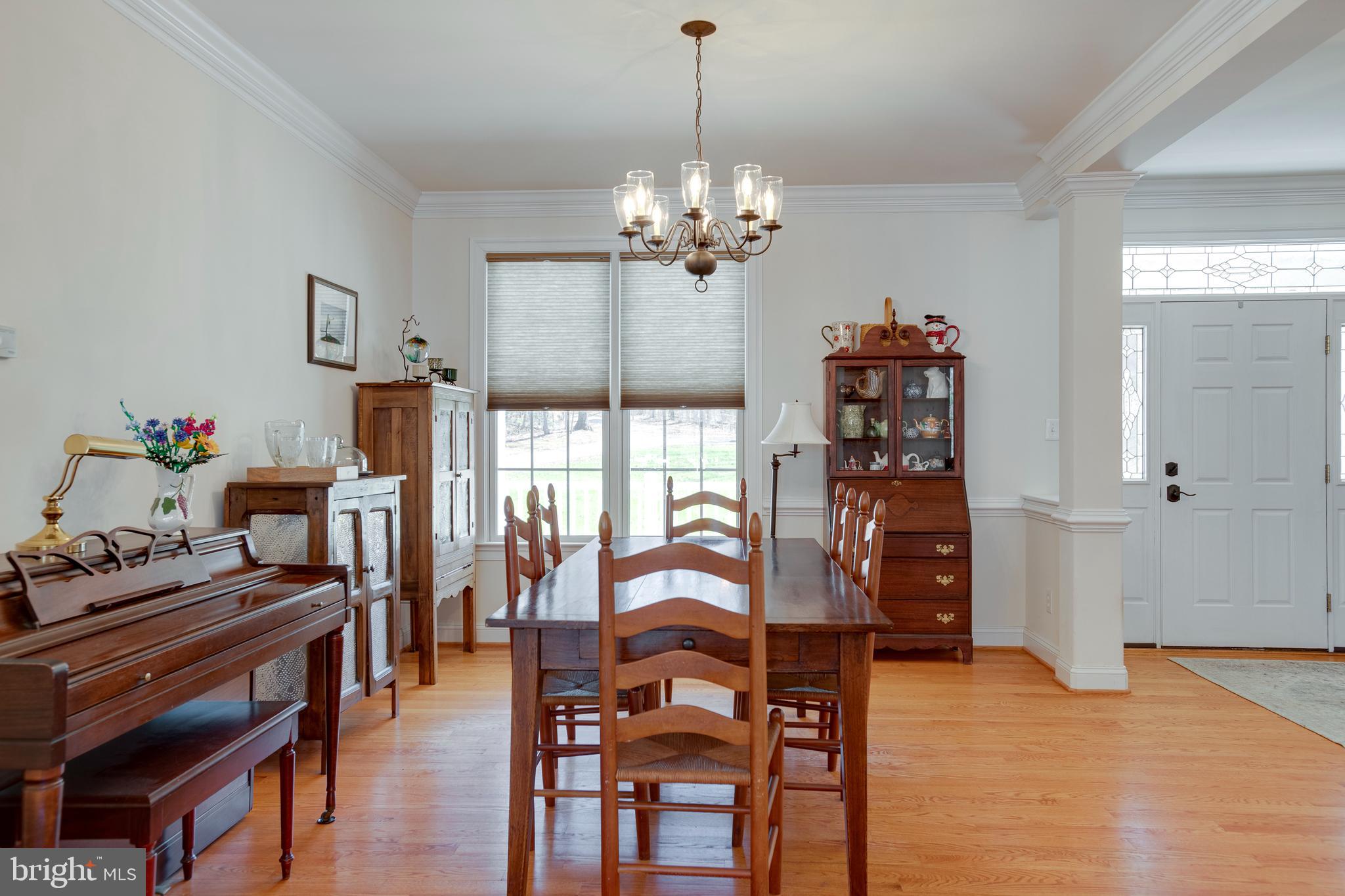 3279 Ridgeview Road Reva, VA 22735 - Photo 6 of 87 a view of a dining room with furniture and chandelier