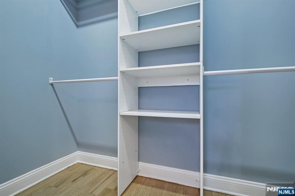 186 Walnut Street, Unit 114 Bloomfield, NJ 07003 - Photo 24 of 30 a view of an empty walk in closet