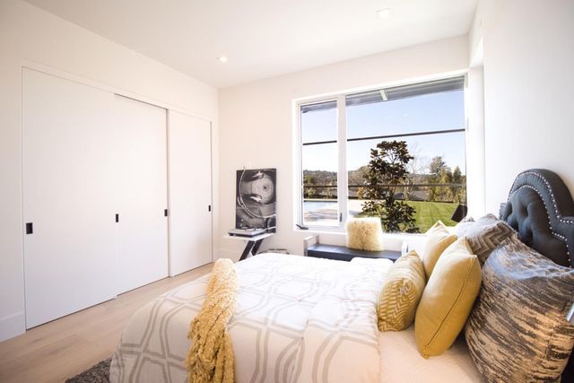 a bathroom with a toilet and shower