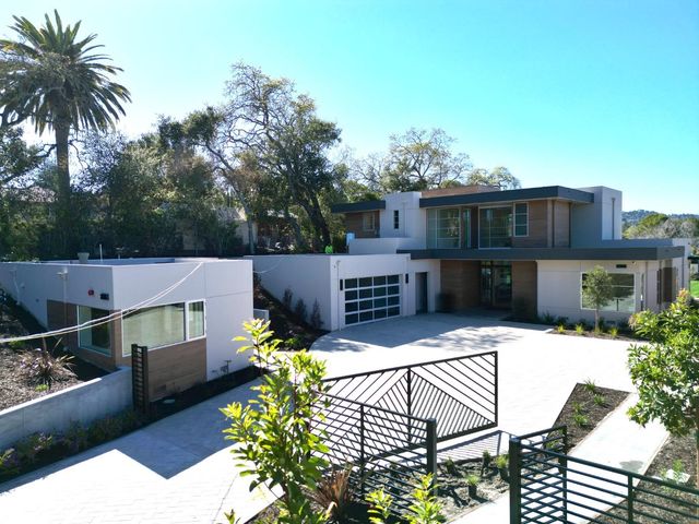 a view of a chairs and table on the terrace