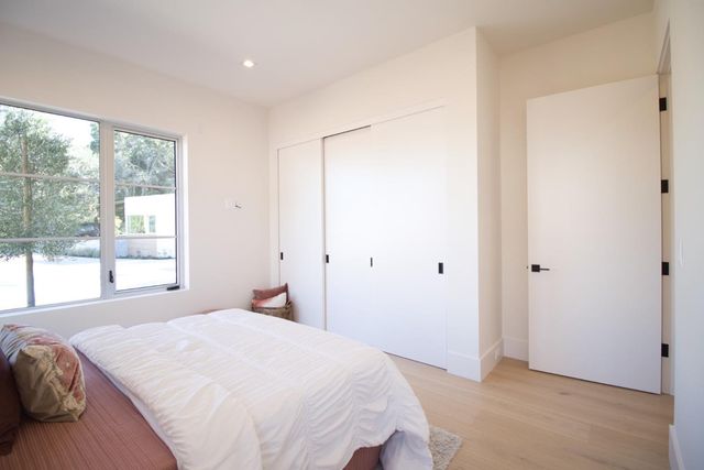 a kitchen with stainless steel appliances granite countertop a stove and a sink
