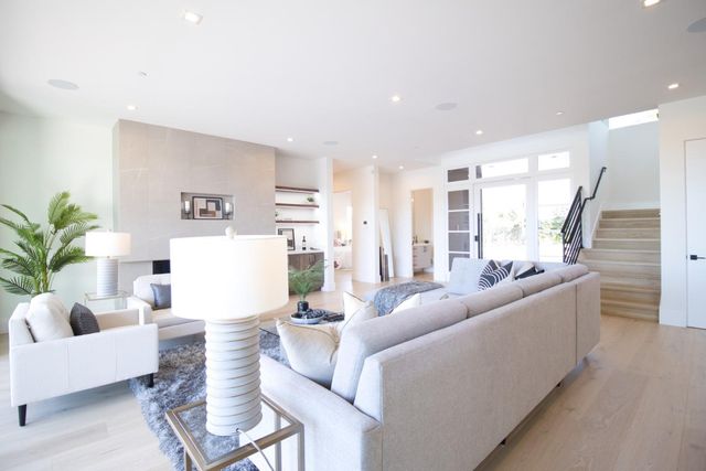 a bedroom with a bed and a couch