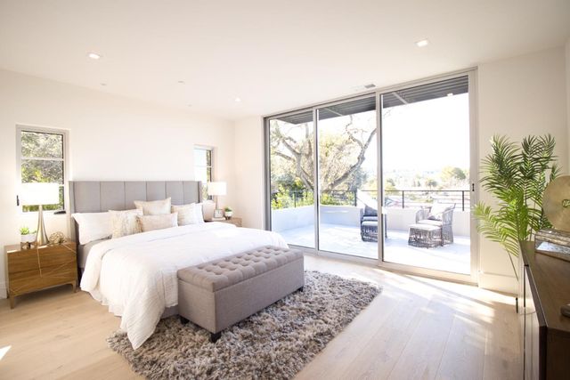 a view of a room that has a window in it