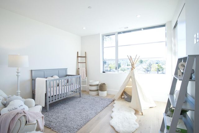a view of a house with swimming pool and sitting area