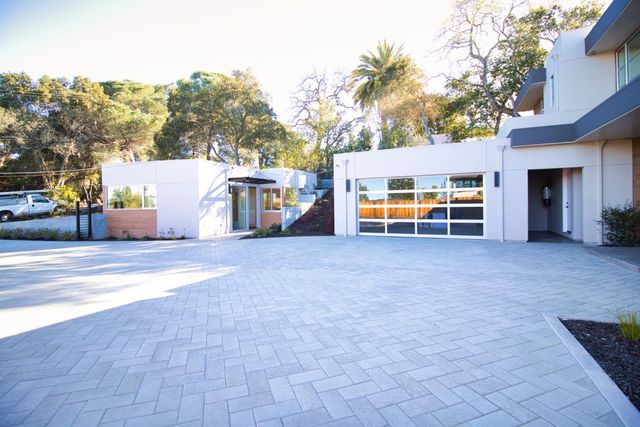 a bedroom with a bed and a shower