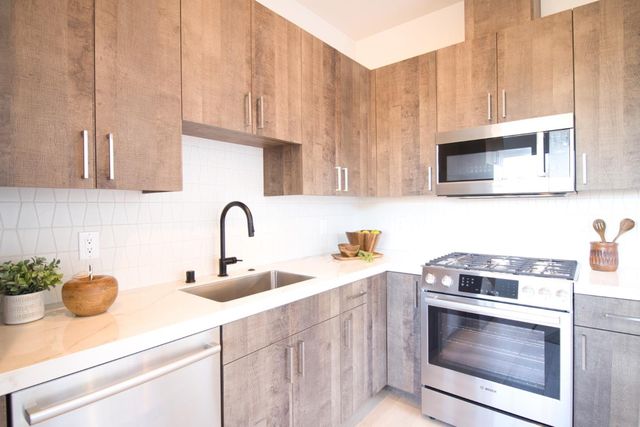 a view of a yard with swimming pool