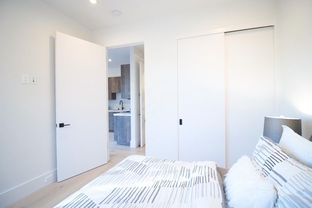 an aerial view of a house with a swimming pool