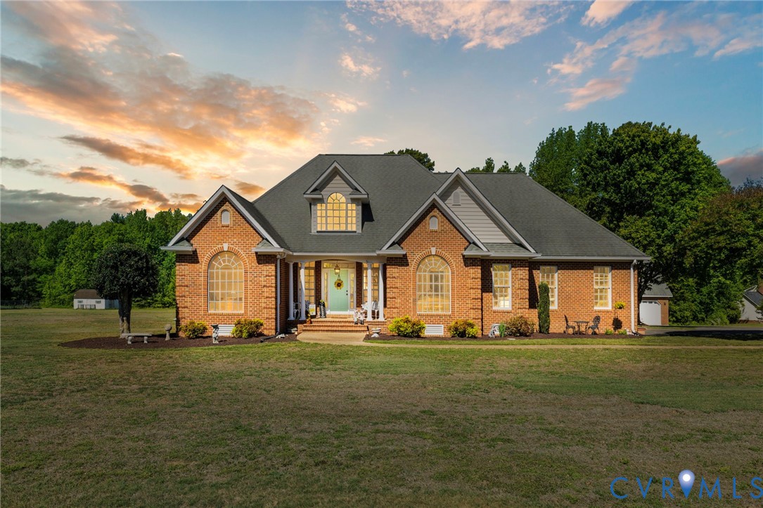 15441 Goshen Road Montpelier, VA 23192 - Photo 1 of 47 a front view of a house with a yard