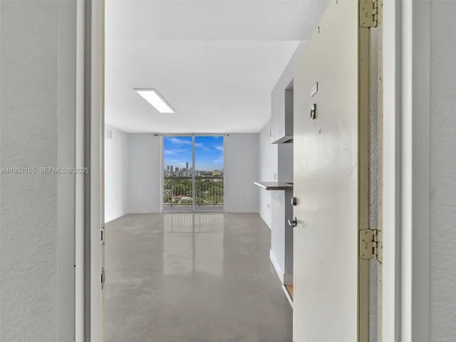 a kitchen with stainless steel appliances granite countertop a sink and a cabinets