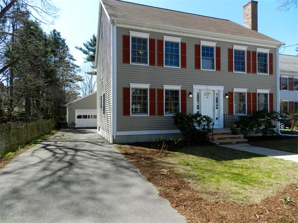 58 Pershing Road Boston, MA 02130 - Photo 1 of 30 a front view of house with yard and green space