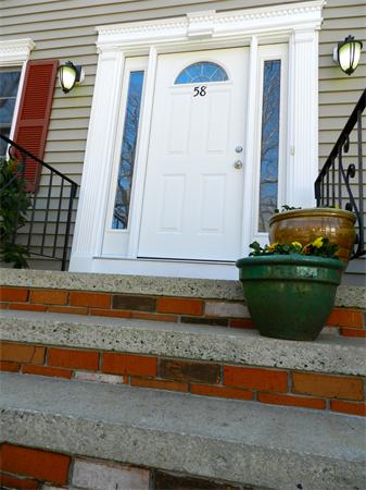 58 Pershing Road Boston, MA 02130 - Photo 2 of 30 a front view of a house with a yard