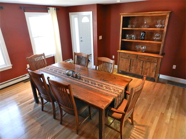 58 Pershing Road Boston, MA 02130 - Photo 8 of 30 a dining room with furniture and wooden floor