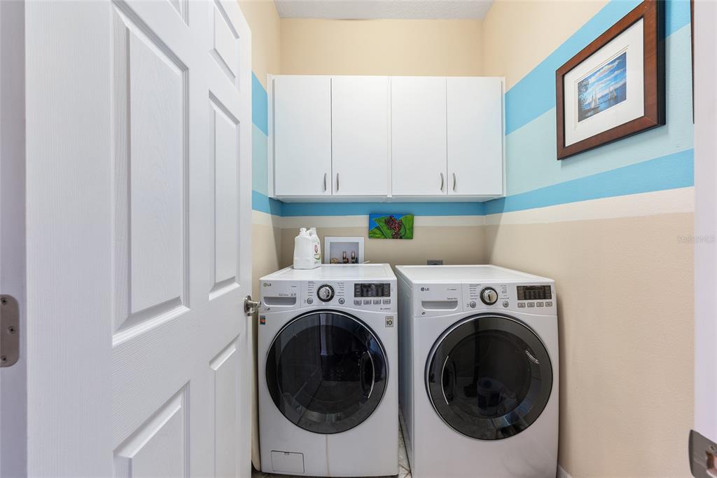 7676 Southwest 94th Circle Ocala, FL 34481 - Photo 31 of 45 a utility room with dryer and washer