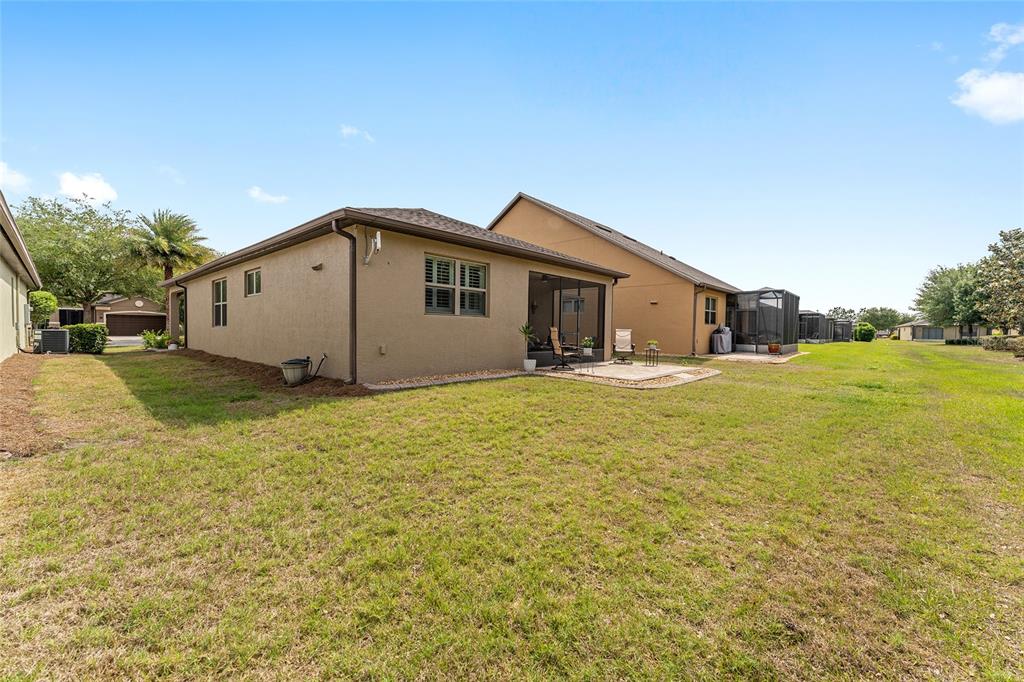 7676 Southwest 94th Circle Ocala, FL 34481 - Photo 37 of 45 a house view with a outdoor space