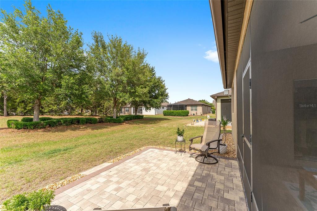 7676 Southwest 94th Circle Ocala, FL 34481 - Photo 42 of 45 a view of a lake with couches and trees