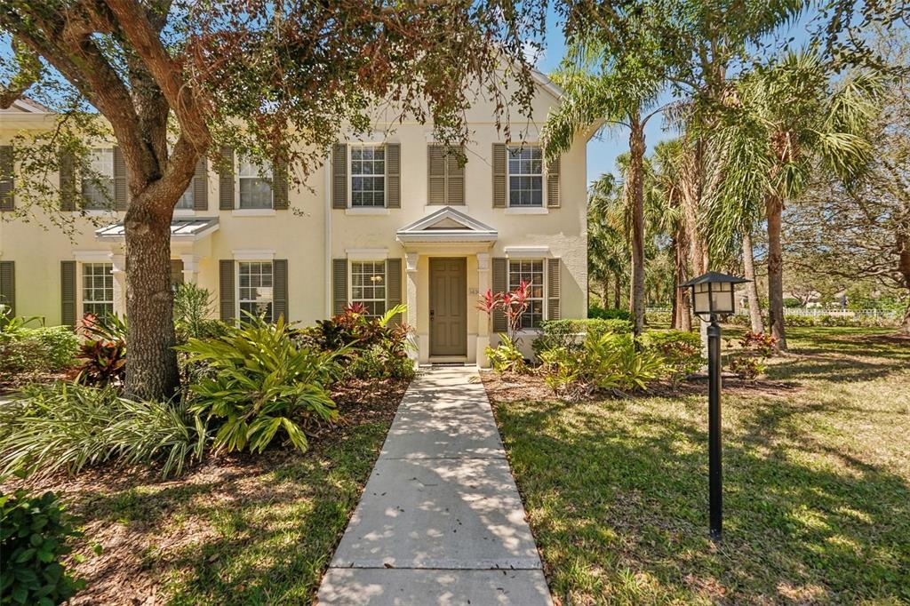5630 Simonton Street Bradenton, FL 34203 - Photo 1 of 1 a front view of a house with a yard