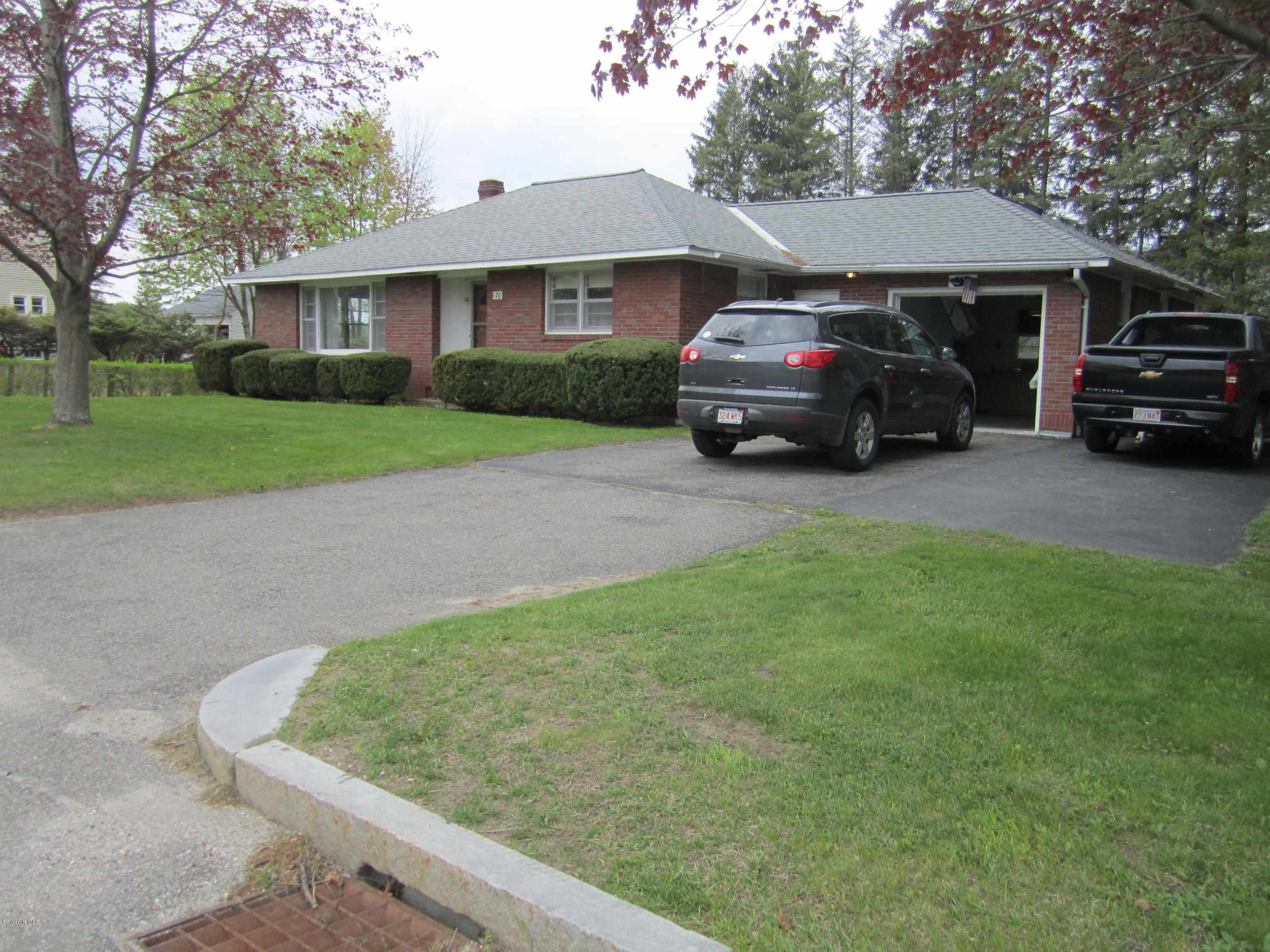170 East Road Adams, MA 01220 - Photo 2 of 28 a house view with a garden space
