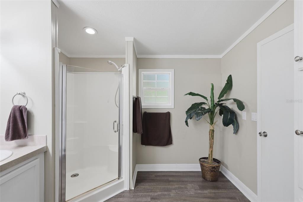 41736 Apollo Lane DeLand, FL 32720 - Photo 27 of 49 a view of hallway with a potted plant