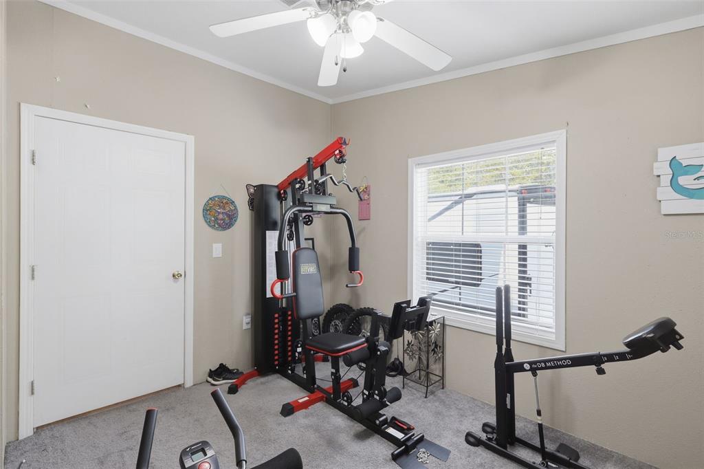41736 Apollo Lane DeLand, FL 32720 - Photo 30 of 49 a view of a room with gym equipment
