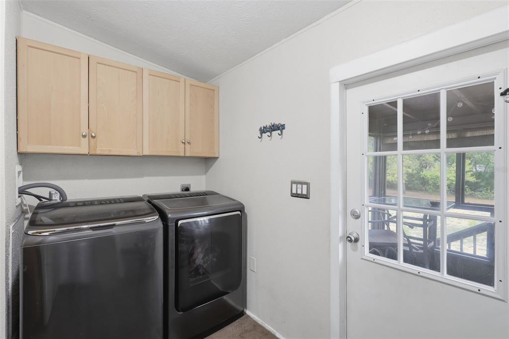 41736 Apollo Lane DeLand, FL 32720 - Photo 33 of 49 a utility room with dryer and washer