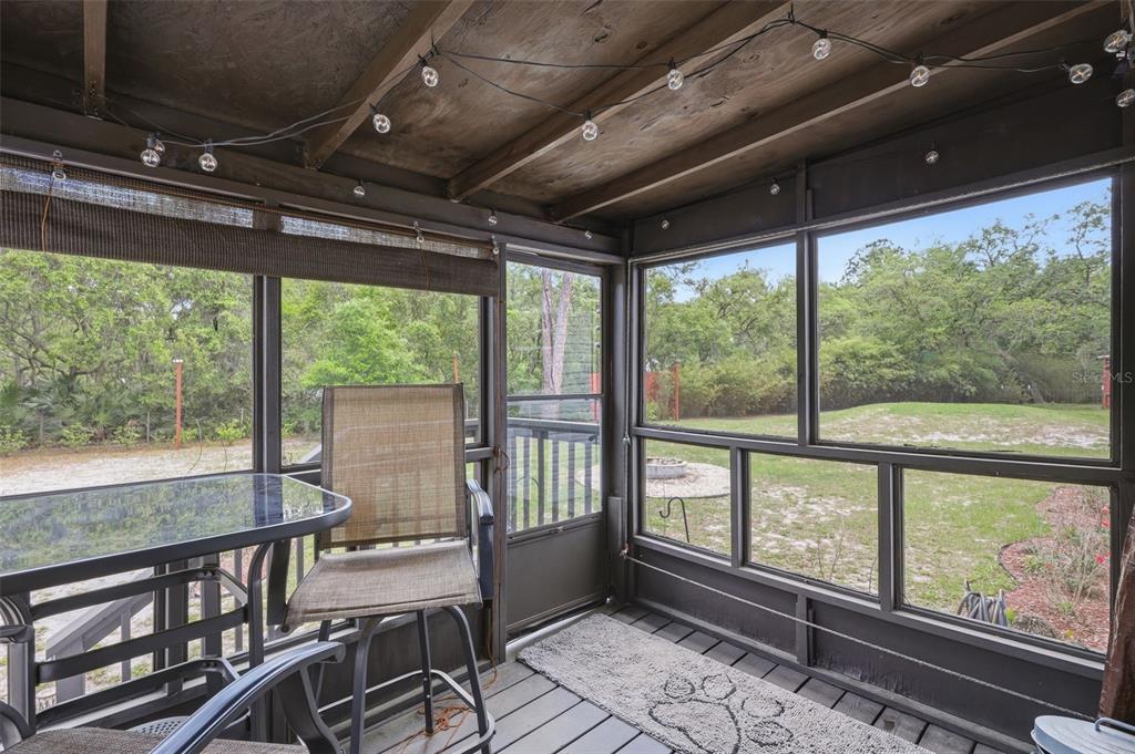 41736 Apollo Lane DeLand, FL 32720 - Photo 34 of 49 a view of a room with wooden floor